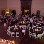 Horseshoe shape of round tables.