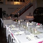 Tuscan style head table in front of vault (significant others of wedding party included).